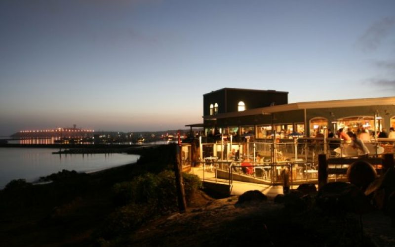 Sam's Chowder House Half Moon Bay ocean front seafood restaurant at dusk